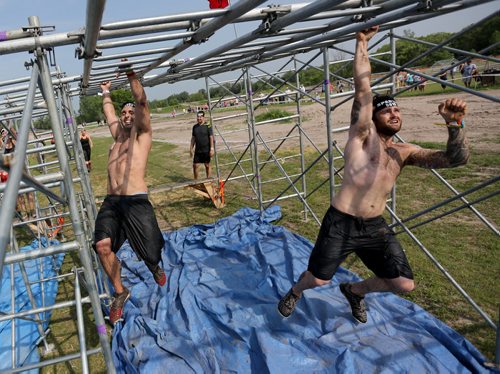 Competitors at the Spartan Race, a 5km obstacle course in Grunthal, Saturday, July 11, 2015. (TREVOR HAGAN/WINNIPEG FREE PRESS)