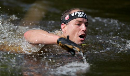 Competitors at the Spartan Race, a 5km obstacle course in Grunthal, Saturday, July 11, 2015. (TREVOR HAGAN/WINNIPEG FREE PRESS)