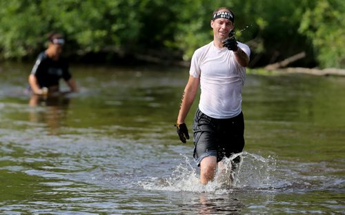 Competitors at the Spartan Race, a 5km obstacle course in Grunthal, Saturday, July 11, 2015. (TREVOR HAGAN/WINNIPEG FREE PRESS)