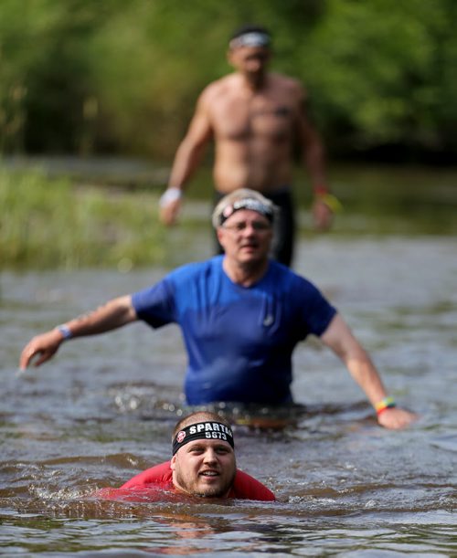 Competitors at the Spartan Race, a 5km obstacle course in Grunthal, Saturday, July 11, 2015. (TREVOR HAGAN/WINNIPEG FREE PRESS)