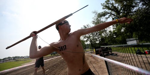 Competitors at the Spartan Race, a 5km obstacle course in Grunthal, Saturday, July 11, 2015. (TREVOR HAGAN/WINNIPEG FREE PRESS)