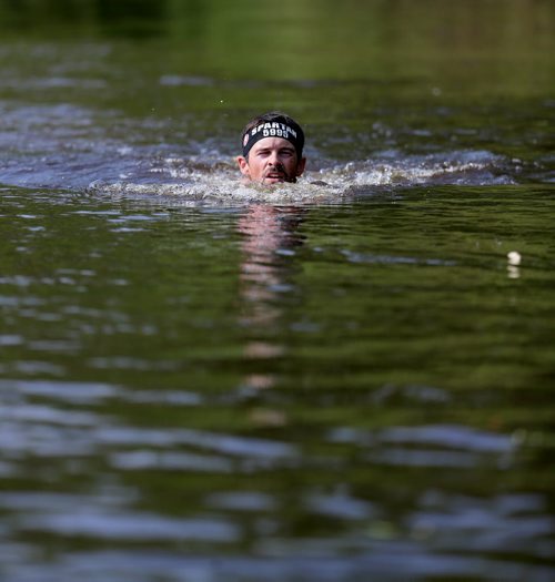 Competitors at the Spartan Race, a 5km obstacle course in Grunthal, Saturday, July 11, 2015. (TREVOR HAGAN/WINNIPEG FREE PRESS)