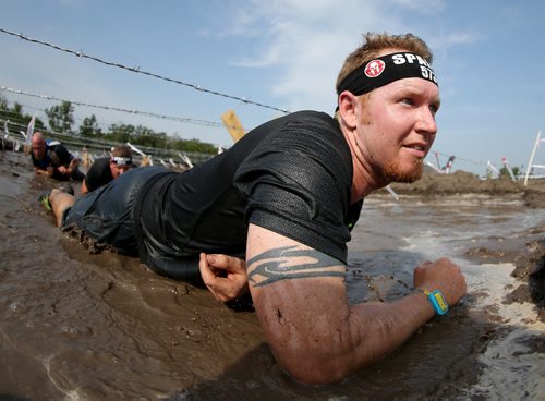 Competitors at the Spartan Race, a 5km obstacle course in Grunthal, Saturday, July 11, 2015. (TREVOR HAGAN/WINNIPEG FREE PRESS)