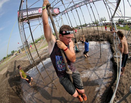 Competitors at the Spartan Race, a 5km obstacle course in Grunthal, Saturday, July 11, 2015. (TREVOR HAGAN/WINNIPEG FREE PRESS)