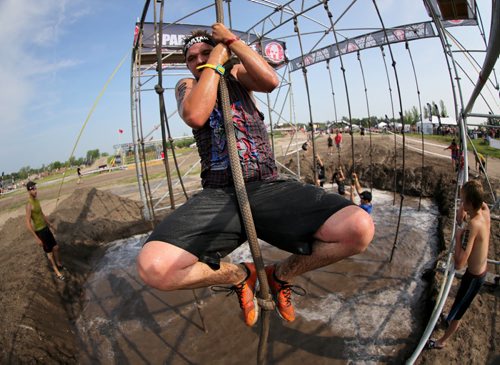 Competitors at the Spartan Race, a 5km obstacle course in Grunthal, Saturday, July 11, 2015. (TREVOR HAGAN/WINNIPEG FREE PRESS)