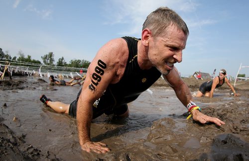 Competitors at the Spartan Race, a 5km obstacle course in Grunthal, Saturday, July 11, 2015. (TREVOR HAGAN/WINNIPEG FREE PRESS)