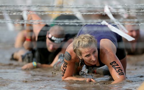 Competitors at the Spartan Race, a 5km obstacle course in Grunthal, Saturday, July 11, 2015. (TREVOR HAGAN/WINNIPEG FREE PRESS)