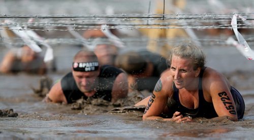 Competitors at the Spartan Race, a 5km obstacle course in Grunthal, Saturday, July 11, 2015. (TREVOR HAGAN/WINNIPEG FREE PRESS)