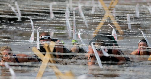 Competitors at the Spartan Race, a 5km obstacle course in Grunthal, Saturday, July 11, 2015. (TREVOR HAGAN/WINNIPEG FREE PRESS)