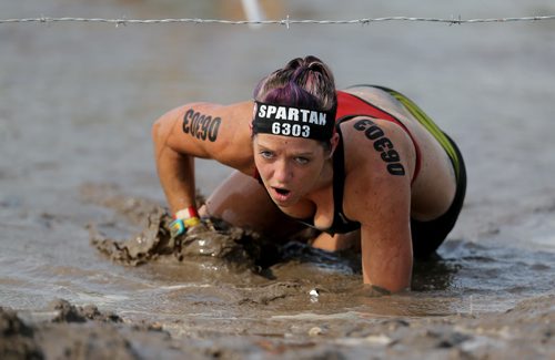 Competitors at the Spartan Race, a 5km obstacle course in Grunthal, Saturday, July 11, 2015. (TREVOR HAGAN/WINNIPEG FREE PRESS)