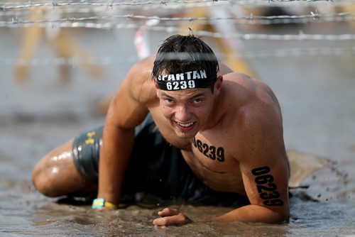 Competitors at the Spartan Race, a 5km obstacle course in Grunthal, Saturday, July 11, 2015. (TREVOR HAGAN/WINNIPEG FREE PRESS)