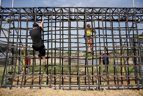 Competitors at the Spartan Race, a 5km obstacle course in Grunthal, Saturday, July 11, 2015. (TREVOR HAGAN/WINNIPEG FREE PRESS)