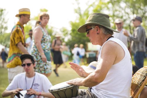 Paul Long leads a jam circle at the Winnipeg Folk Festival at Birds Hill Provincial Park on Saturday, July 11, 2015.   Mikaela MacKenzie / Winnipeg Free Press