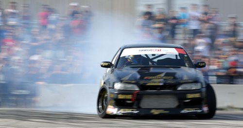 Mats Baribeau, from Brockville, Ontario, driving during a Formula D Canada drifting demo at the Red River Ex Grounds during Driven, a car show, Saturday, July 11, 2015. (TREVOR HAGAN/WINNIPEG FREE PRESS)