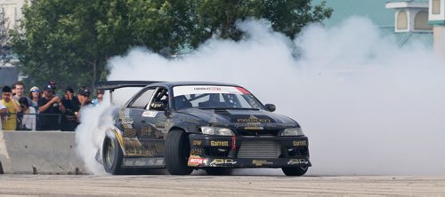 Mats Baribeau, from Brockville, Ontario, driving during a Formula D Canada drifting demo at the Red River Ex Grounds during Driven, a car show, Saturday, July 11, 2015. (TREVOR HAGAN/WINNIPEG FREE PRESS)