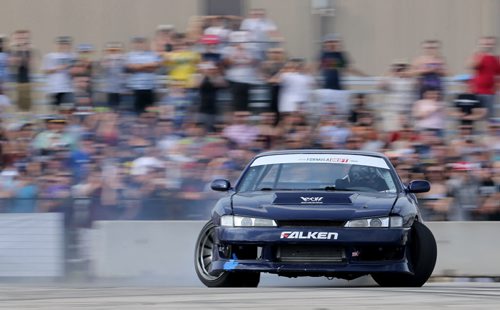 Brad Carlton, from Mississauga, Ontario, drifting during a Formula D Canada drifting demo at the Red River Ex Grounds during Driven, a car show, Saturday, July 11, 2015. (TREVOR HAGAN/WINNIPEG FREE PRESS)