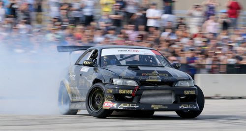 Mats Baribeau, from Brockville, Ontario, drifting, during a Formula D Canada demo at the Red River Ex Grounds during Driven, a car show, Saturday, July 11, 2015. (TREVOR HAGAN/WINNIPEG FREE PRESS)