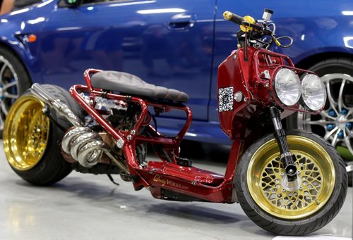 A modified Honda Ruckus at Driven 2015, a car show at the Red River Exhibition Grounds, Saturday, July 11, 2015. (TREVOR HAGAN/WINNIPEG FREE PRESS)