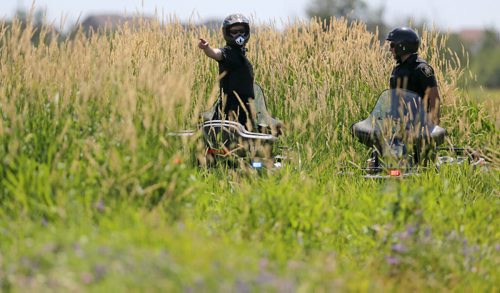 Winnipeg Police using ATV's to search for Thelma Krull in East Kildonan, Sunday, July 12, 2015. (TREVOR HAGAN/WINNIPEG FREE PRESS)