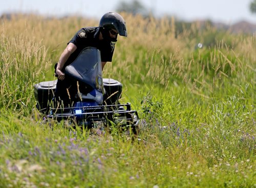 Winnipeg Police using ATV's to search for Thelma Krull in East Kildonan, Sunday, July 12, 2015. (TREVOR HAGAN/WINNIPEG FREE PRESS)