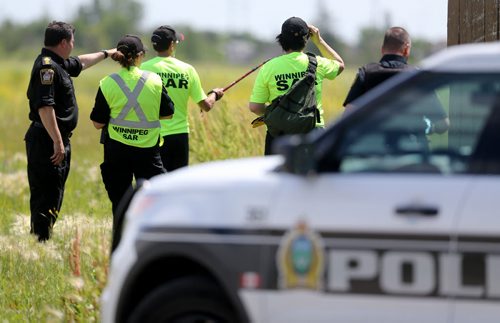 Winnipeg Police coordinating with Winnipeg Search and Rescue, (WINSAR) searhing for Thelma Krull in East Kildonan, Sunday, July 12, 2015. (TREVOR HAGAN/WINNIPEG FREE PRESS)