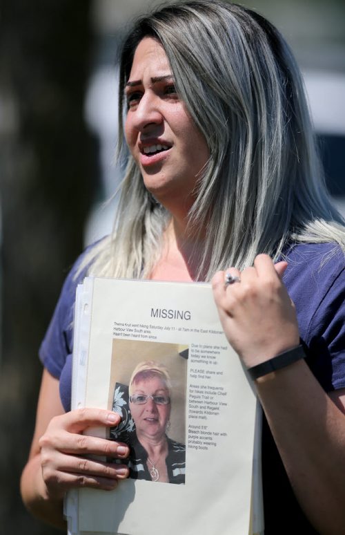 Connie Muscat, helping organize friends and neighbours as they search for Thelma Krull in East Kildonan, Sunday, July 12, 2015. (TREVOR HAGAN/WINNIPEG FREE PRESS)