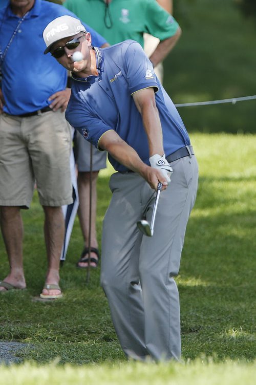 July 12, 2015 - 150712  -  Mackenzie Hughes takes his shot on the 18th in the final round of The Player's Cup Sunday, July 12, 2015. John Woods / Winnipeg Free Press