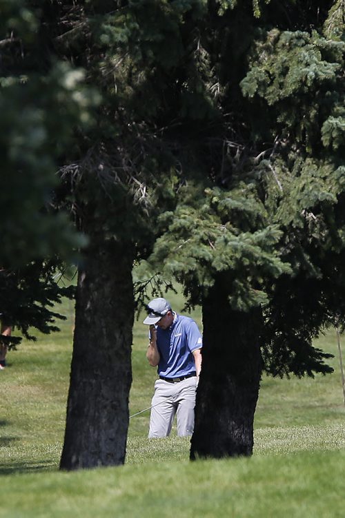 July 12, 2015 - 150712  -  Mackenzie Hughes reacts to his shot on the 18th of the final round at The Player's Cup Sunday, July 12, 2015. John Woods / Winnipeg Free Press