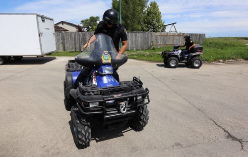 Winnipeg Police use ATV's to search for Thelma Krull, Sunday, July 12, 2015. (TREVOR HAGAN / WINNIPEG FREE PRESS)