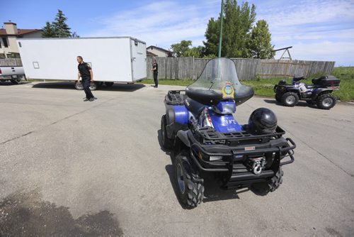 ATVs sit idle before Winnipeg Police start the search for Thelma Krull, Sunday, July 12, 2015. (TREVOR HAGAN / WINNIPEG FREE PRESS)