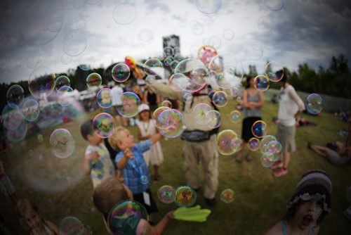 July 12, 2015 - 150712  -  Bubbles and giggles fill the air at the Winnipeg Folk Fest Sunday, July 12, 2015. John Woods / Winnipeg Free Press