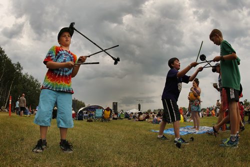 July 12, 2015 - 150712  -  Callum Damm performs some tricks with his friends at the Winnipeg Folk Fest Sunday, July 12, 2015. John Woods / Winnipeg Free Press