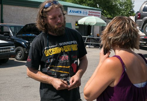Ollie Ehrmantraut, who owns Ollie's Garage in East Kildonan, talking with Laura Branconnier at about he spot they received a package that turned out to be a letter bomb allegedly sent by Guido Amsel. He thinks the package arrived July 2. It was addressed to Ollie's Garage, but with Amsel's ex-wife Iris Amsel's name on it. The package was detonated by the bomb squad on July 4th. Guido Amsel  has been charged with two counts of attempted murder related to the explosion that injured Maria Mitousis July 3, 2015. July 13, 2015 - MELISSA TAIT / WINNIPEG FREE PRESS
