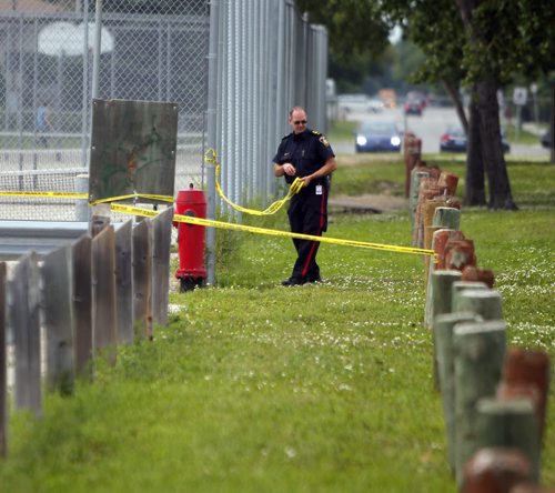Ident unit  in behind Kildonan East Collegiate school. They taped off part of the parking lot where tire tracks lead into the park. May be of interest. Search for missing Thelma Krull. BORIS MINKEVICH/WINNIPEG FREE PRESS July 14, 2015