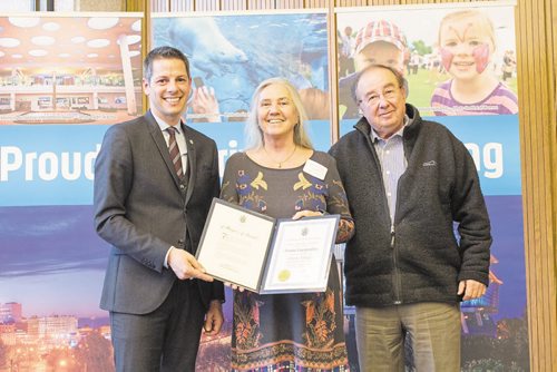 Canstar Community News Basil and Donna Lagopoulos (pictured above) of Desart in Osborne Village accepted the Mayors BIZ Award from Mayor Brian Bowman for their work with the Osborne Village Business Improvement Zone at a ceremony at City Hall on May 14.