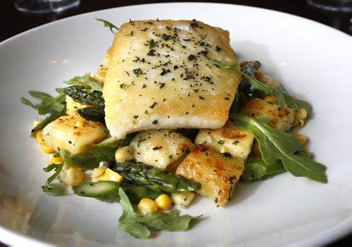 Restaurant Review  on the Capital Grill and Bar. This is the Pan Roasted Halibut.  Marion Warhaft  story. Wayne Glowacki / Winnipeg Free Press July 14 2015