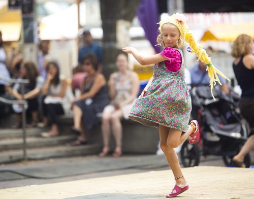 Evelyn Johnson, 5, dances at the Winnipeg Fringe Festival kick-off at the Old Market Square in Winnipeg on Wednesday, July 15, 2015.   Mikaela MacKenzie / Winnipeg Free Press