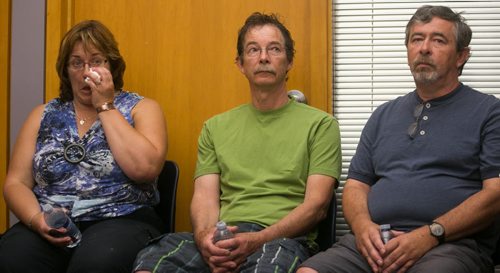 Thelma Krull's sister-in-law Lynda Stelmach (left), brother-in-law Jim Krull and husband Robert Krull at a police press conference on the fifth day since Thelma Krull went missing in the Harbourview area on July 11, 2015.  July 15, 2015 - MELISSA TAIT / WINNIPEG FREE PRESS