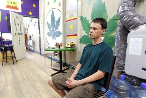Winnipeg's only medical marijuana dispensary Your Medical Cannabis Headquarters on Main Street employee William Bell talks to the FP reporter. BORIS MINKEVICH/WINNIPEG FREE PRESS July 16, 2015