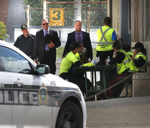 Winnipeg Police and Cadets outside the Valley Gardens Community Centre Thursday involved in the search for Thelma Krull. Wayne Glowacki / Winnipeg Free Press July 16 2015