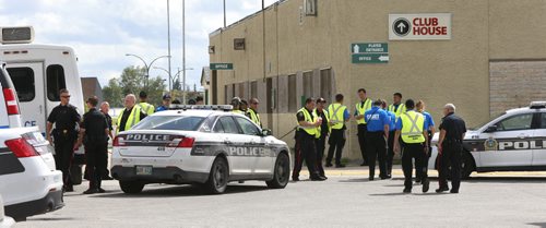 Winnipeg Police and Cadets outside the Valley Gardens Community Centre Thursday involved in the search for Thelma Krull. Wayne Glowacki / Winnipeg Free Press July 16 2015