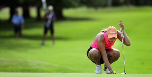 Veronica Vetesnik sets up her ball to putt on the 16th at Elmhurst Thursday afternoon on her way to winning the Women's Junior Championship. See Tim Canpbell's story. July 16, 2015 - (Phil Hossack / Winnipeg Free Press)