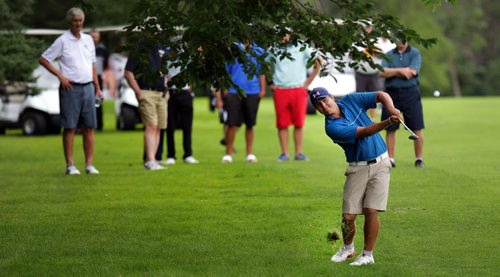 Marco Trstenjak chips onto the 16th at Elmhurst CC during a tight race in the Men's Junior Championship. See Tim Campbell's story. July 16, 2015 - (Phil Hossack / Winnipeg Free Press)