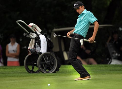 Wesley Hoydalo uses all the body language he has on the 18th green Thursday as his ball rims the cup. THe next one sank to win him the Men's Junior Championship at Elmhurst CC. See Tim Campbell's story. July 16, 2015 - (Phil Hossack / Winnipeg Free Press)