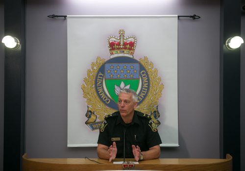 Const. Eric Hofley speaks to media Friday morning, as the search for missing 57-year-old Thelma Krull continues. Homicide Detectives have taken the lead in the investigation, but police are still treating the case as missing persons. July 17, 2015 - MELISSA TAIT / WINNIPEG FREE PRESS
