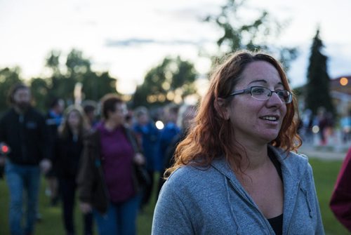 Lisa Besser, Thelma's daughter, leads the walk to "light the way" for her mother on Concordia Avenue in Winnipeg on Saturday, July 18, 2015.   Mikaela MacKenzie / Winnipeg Free Press
