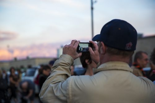 Family, friends, and residents of the community gather for a walk to "light the way" for Thelma on Concordia Avenue in Winnipeg on Saturday, July 18, 2015.   Mikaela MacKenzie / Winnipeg Free Press