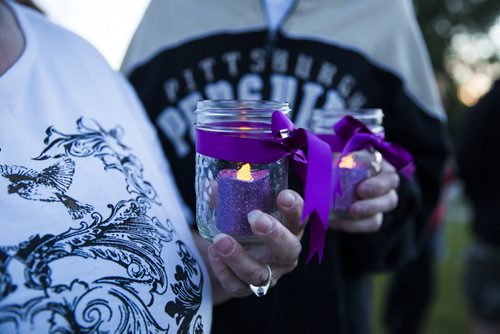 Family, friends, and residents of the community come together for a walk to "light the way" for Thelma on Concordia Avenue in Winnipeg on Saturday, July 18, 2015.   Mikaela MacKenzie / Winnipeg Free Press