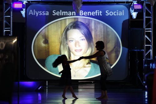 July 19, 2015 - 150719  -  Dalia Stewart dances with her granddaughter Rilee at a benefit social for Alyssa Selman at Assiniboin Downs Sunday July 19, 2015. Over 800 people came together to support Selman who suffered a broken back while riding a horse in a race at the Downs. John Woods / Winnipeg Free Press