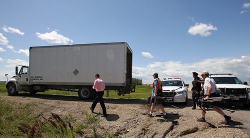 The cube truck that rammed police vehicles at the PSB before the lunch hour sits on the south side of the TransCanada Hwy just west of Portage la Prairie Monday afternoon.  150719 July 19, 2015 MIKE DEAL / WINNIPEG FREE PRESS